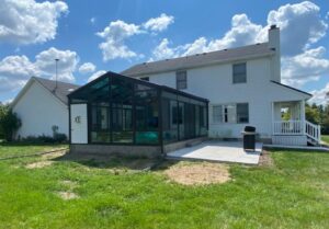 Exterior four season glass roof cathedral sunroom addition Bountiful Utah - attached patio - Four Seasons Home Improvements